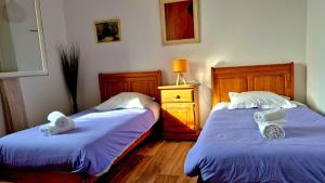 Postel nebo postele na pokoji v ubytování Villa L'Alivu