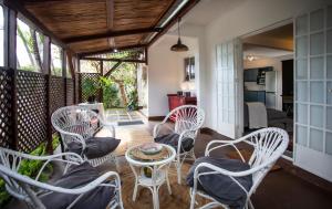 Posezení v ubytování SANDY LANE COTTAGE