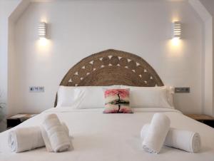 Postel nebo postele na pokoji v ubytování Hostal Aires del Mar