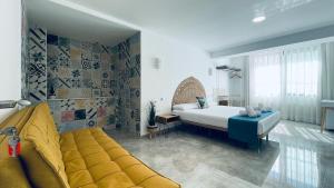Postel nebo postele na pokoji v ubytování Hostal Aires del Mar