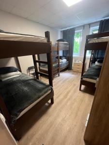 Voodi või voodid majutusasutuse Santel Apart Hostel toas