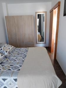 Posteľ alebo postele v izbe v ubytovaní Apartament Bisaura de Ter