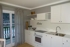 Kuchyň nebo kuchyňský kout v ubytování Ferienwohnung Grünwald