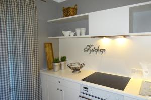 Kuchyň nebo kuchyňský kout v ubytování Ferienwohnung Grünwald