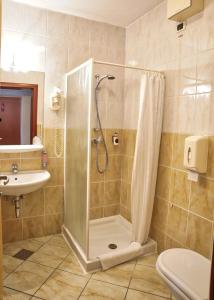 Koupelna v ubytování Hotel Krek Superior + 37 fotografií