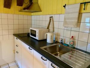 Kuchyň nebo kuchyňský kout v ubytování Ferienwohnung in historischer Mühle