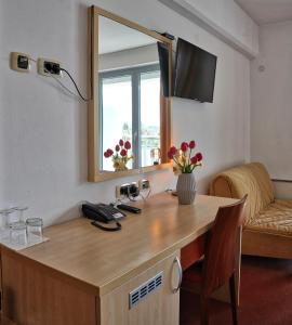 TV a/nebo společenská místnost v ubytování Hotel Krek Superior