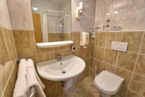 Koupelna v ubytování Hotel Krek Superior