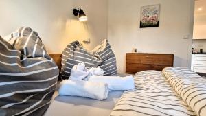 Postel nebo postele na pokoji v ubytování Apartmány Včelín