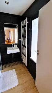 Koupelna v ubytování Apartmány Včelín
