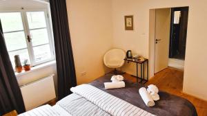 Postel nebo postele na pokoji v ubytování Apartmány Včelín