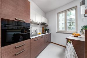 Dapur atau dapur kecil di Apartament Mokotów -basen-
