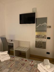 TV a/nebo společenská místnost v ubytování Hotel Sciatori 3 Stelle Superior