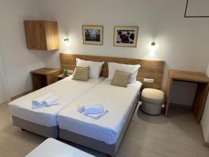 Postel nebo postele na pokoji v ubytování A-Rooms Serviced Accommodation in Mostar