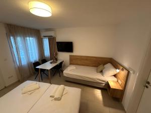 Postel nebo postele na pokoji v ubytování A-Rooms Serviced Accommodation in Mostar