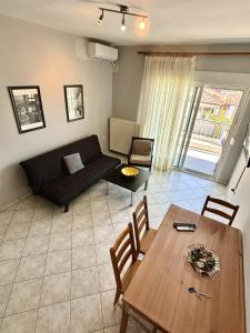 Posezení v ubytování MIna Apartments 2 Nea Kallikrateia