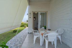 Patio nebo venkovní prostory v ubytování Agri Lemon Green Case vacanze