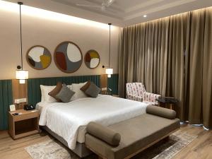 Postel nebo postele na pokoji v ubytování Regency Tuticorin by GRT Hotels