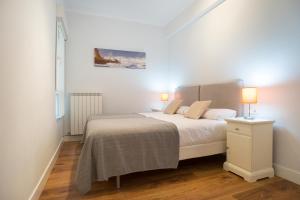 Posteľ alebo postele v izbe v ubytovaní Playa Gros - IB. Apartments