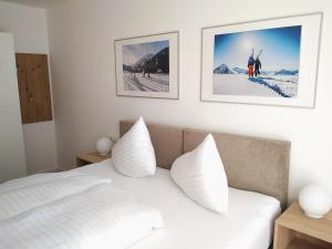 Voodi või voodid majutusasutuse Appartements am Kirchplatz toas