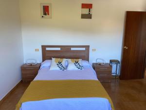 A bed or beds in a room at Casa Portomeiro