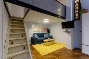 Posezení v ubytování Super Central Apartment
