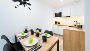 Η κουζίνα ή μικρή κουζίνα στο VacationClub - Nadrzeczna 3E Apartament 16