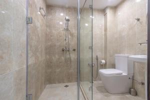 Koupelna v ubytování Deluxe City Hotel
