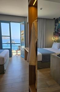 Voodi või voodid majutusasutuse Nireus Hotel toas