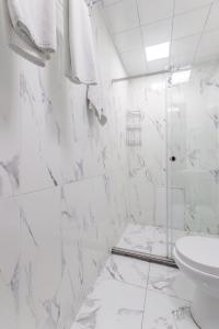 Koupelna v ubytování Deluxe City Hotel