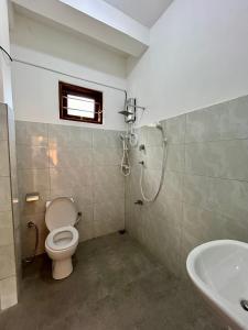 Koupelna v ubytování Shadow Homestay
