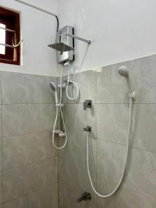 Koupelna v ubytování Shadow Homestay