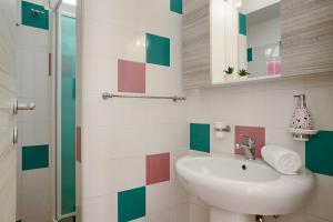 A bathroom at Villa Dema, sea front & beach 20 mt