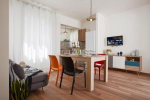A kitchen or kitchenette at Villa Dema, sea front & beach 20 mt