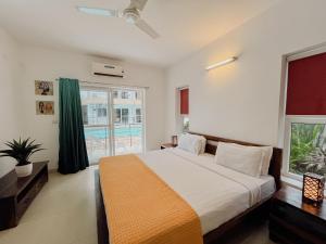 Uma cama ou camas num quarto em Rainforest Enclave, Arpora - 10 mins to Baga beach
