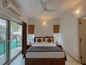 Uma cama ou camas num quarto em Rainforest Enclave, Arpora - 10 mins to Baga beach