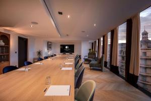 a long conference room with a long table and chairs at Doubletree By Hilton Nice Centre Iconic in Nice
