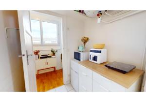 Fotografie z fotogalerie ubytování JOIVY Charming studio with Eiffel Tower View v Paříži