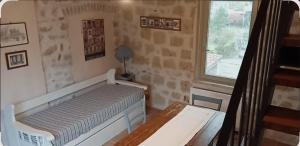 Ένα ή περισσότερα κρεβάτια σε δωμάτιο στο casale delle rondini