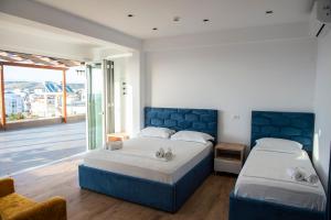 Katil atau katil-katil dalam bilik di Summer Point Hotel +41 gambar