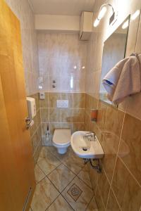 Koupelna v ubytování Hotel Krek Superior