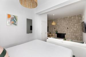 Postel nebo postele na pokoji v ubytování Kiwi by halu!, Apartments in Perea