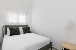 Postel nebo postele na pokoji v ubytování Kiwi by halu!, Apartments in Perea