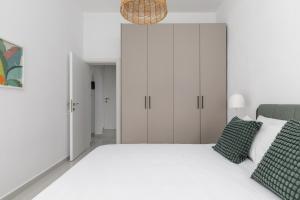 Postel nebo postele na pokoji v ubytování Kiwi by halu!, Apartments in Perea