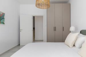 Postel nebo postele na pokoji v ubytování Kiwi by halu!, Apartments in Perea