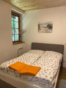 Postel nebo postele na pokoji v ubytování Apartmány Telnice - Medorhof
