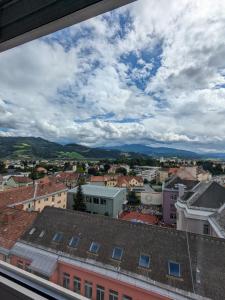 a city view from the roof of a building at Penthouse near Red Bull Ring in Knittelfeld