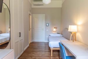 Ein Bett oder Betten in einem Zimmer der Unterkunft HOTEL DELLE CIVETTE