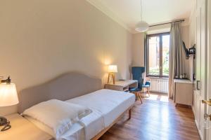 Ein Bett oder Betten in einem Zimmer der Unterkunft HOTEL DELLE CIVETTE