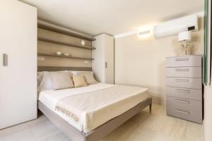 Postel nebo postele na pokoji v ubytování Seaside Home - Dove il mare di Villasimius diventa casa